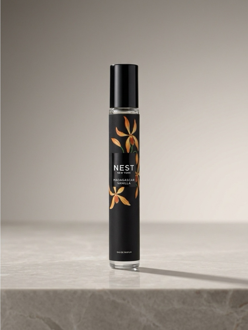 NEST Fragrances Madagascar Vanilla Rollerball in Black with Gold Floral Accent